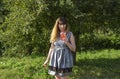 Smiling young woman drinking fresh lemonade with a straw. Concept of health, relax and lifestyle Royalty Free Stock Photo