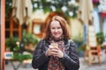 Woman drinking hot red wine on a Christmas market Royalty Free Stock Photo