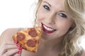 Smiling Young Woman Eating Pizza Slice Royalty Free Stock Photo