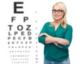 Smiling young woman with eyeglasses