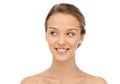 Smiling young woman face and shoulders Royalty Free Stock Photo