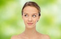 Smiling young woman face and shoulders Royalty Free Stock Photo