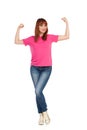 Smiling Young Woman Is Flexing Muscles And Looking At Camera