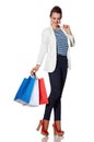 Smiling young woman with French flag colours shopping bags Royalty Free Stock Photo
