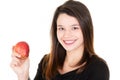 Smiling young woman with healthy teeth holdinh red apple