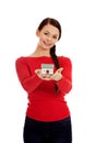 Smiling young woman holding house model Royalty Free Stock Photo