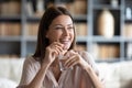 Smiling young woman holding pill and glass of pure water. Royalty Free Stock Photo