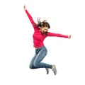 Smiling young woman jumping in air Royalty Free Stock Photo