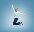 Smiling young woman jumping in air Royalty Free Stock Photo