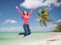 Smiling young woman jumping in air Royalty Free Stock Photo