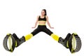 Smiling young woman in kangoo jumps shoes sitting legs apart. Royalty Free Stock Photo