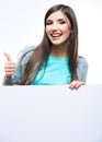 Smiling young woman leaning on big blank board . Royalty Free Stock Photo