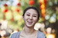 Smiling Young Woman In Nanluoguxiang, Beijing Royalty Free Stock Photo