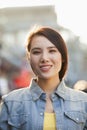 Smiling Young Woman In Nanluoguxiang, Beijing Royalty Free Stock Photo