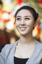 Smiling Young Woman In Nanluoguxiang, Beijing Royalty Free Stock Photo