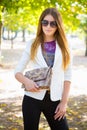 Smiling young woman outdoors Royalty Free Stock Photo