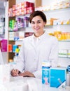 Pharmacist ready to assist in choosing at counter