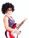 Smiling young woman play guitar over white Royalty Free Stock Photo