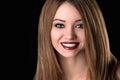 Smiling Young Woman Portrait Black Background. Royalty Free Stock Photo