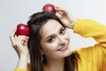Smiling young woman with red apples. Healthy eating and vegetarianism Royalty Free Stock Photo