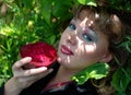 Smiling young woman with the red beets Royalty Free Stock Photo