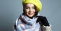 Smiling young woman in scarf and Hat Royalty Free Stock Photo