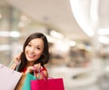 Smiling young woman with shopping bags Royalty Free Stock Photo