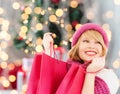 Smiling young woman with shopping bags Royalty Free Stock Photo
