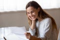 Happy young woman read good news in paper letter Royalty Free Stock Photo