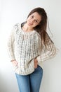 Smiling young woman in sweater