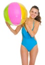 Smiling young woman in swimsuit with beach ball Royalty Free Stock Photo