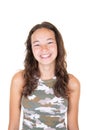 Smiling young woman teenage girl in army shirt over white background