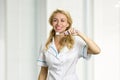 Smiling young woman with toothbrush. Royalty Free Stock Photo