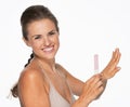 Smiling young woman using nail file Royalty Free Stock Photo