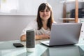 Woman Using Voice Assistant In Office Royalty Free Stock Photo