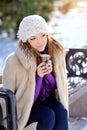 Smiling young woman in white hat Royalty Free Stock Photo