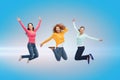 Smiling young women jumping in air Royalty Free Stock Photo