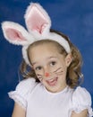 Smilling girl with bunny Royalty Free Stock Photo