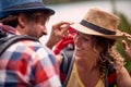 Smilling hiker couple, flirting. Close up shot of beautiful woman and man talking. Love, couple, hiking, nature concept Royalty Free Stock Photo