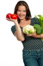 Smilng Woman Holding Vegetables