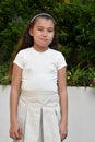 A Smirking Cute Philippina Girl Standing