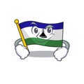 Smirking flag lesotho hoisted on cartoon pole