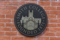 Smith College plaque outside of the financial aid office