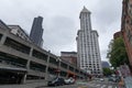 Smith Tower, oldest skyscraper in city, was built in 1914. Sinking ship parking garage, foreground, was built in 1961 when his