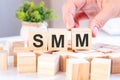 Smm concept with wooden blocks on table, business concept Royalty Free Stock Photo