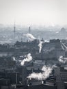 Smog - city air pollution. Unclear atmosphere polluted by smoke rising from the chimneys. Royalty Free Stock Photo