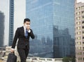 Smog in the city.businessman walking on street