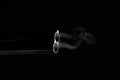 Smoke from a barrel from a gun on a black background Royalty Free Stock Photo