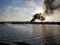 Smoke from a boat fire Royalty Free Stock Photo