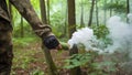 Smoke Bomb in Hand. Prisoner in camouflage with a smoke bomb